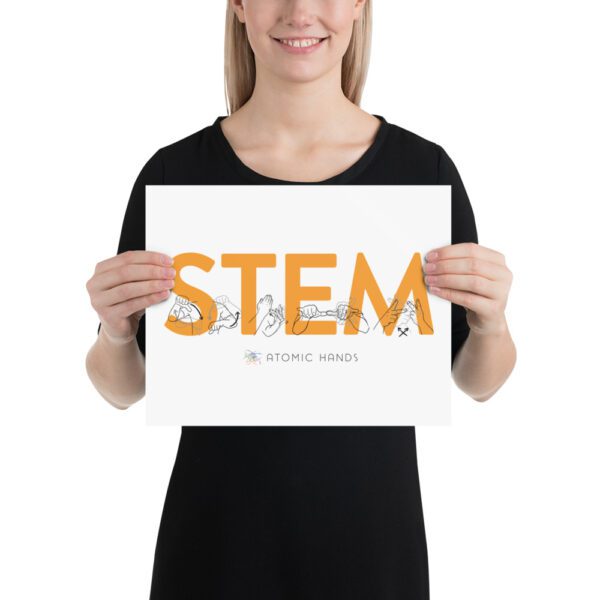 Female model holding a poster that shows "STEM" in orange with black illustrations.