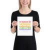 Female model holding a poster that says "women in science, technology, engineering, mathematics" with logo.