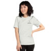Female model wearing ash shirt with "technology" and an illustration of how to sign technology is on the upper left chest