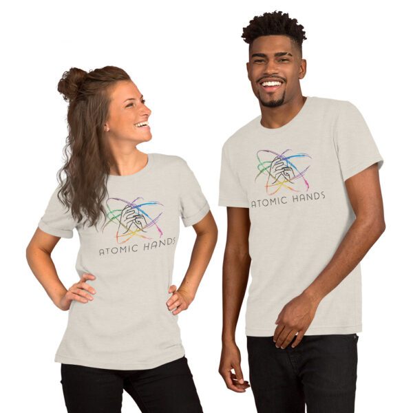 Female and male model wearing dust shirt with atomic hands logo fully across the chest