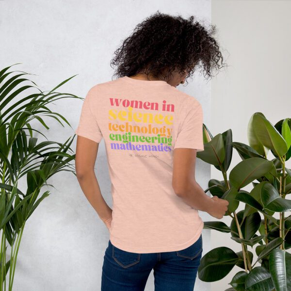 Peach shirt with "women in science, technology, engineering, mathematics" and Atomic Hands logo.