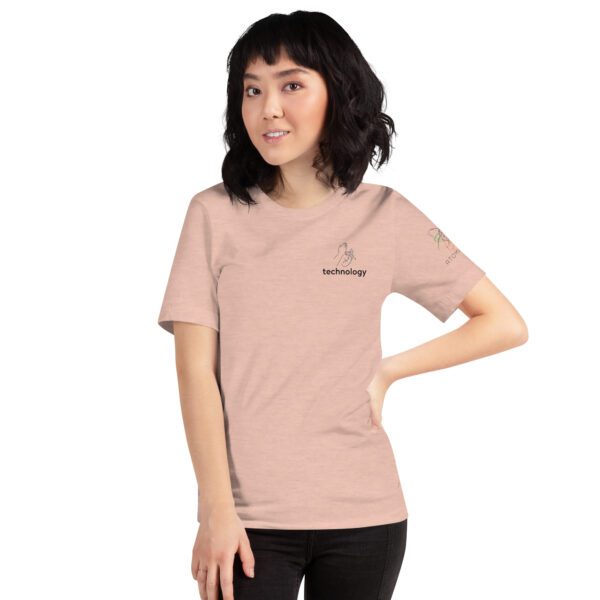 Female model wearing peach shirt with "technology" and an illustration of how to sign technology is on the upper left chest