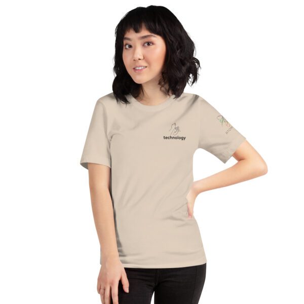 Female model wearing soft cream shirt with "technology" and an illustration of how to sign technology is on the upper left chest