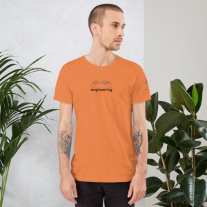 Male model wearing orange shirt with "engineering" and an illustration of how to sign engineering is on the chest