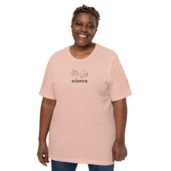 Female model wearing peach shirt with "science" and an illustration of how to sign science is on the chest