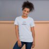 Female model wearing blue shirt with "mathematics" and an illustration of how to sign mathematics is on the chest