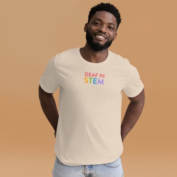 Cream shirt with "deaf in stem" in colors on the chest