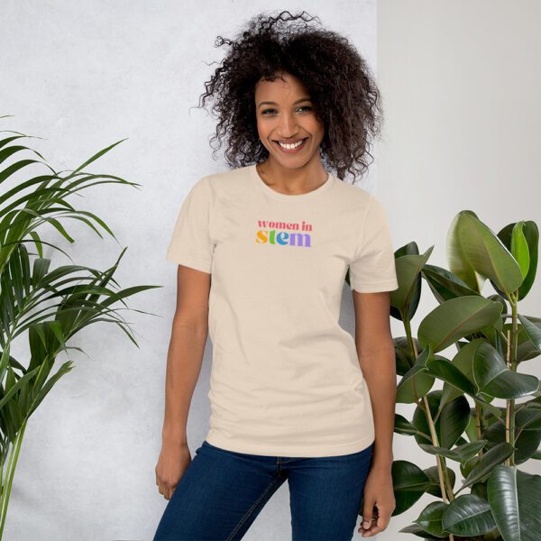 Cream shirt with "women in stem" in colors on the chest