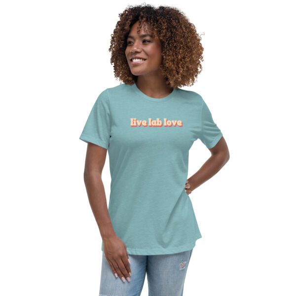 Female model wearing blue shirt with "live lab love" in funky retro font/colors