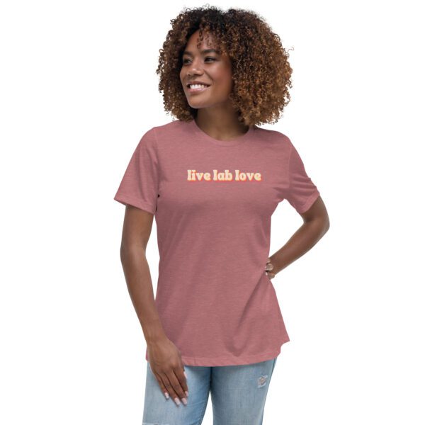 Female model wearing mauve shirt with "live lab love" in funky retro font/colors