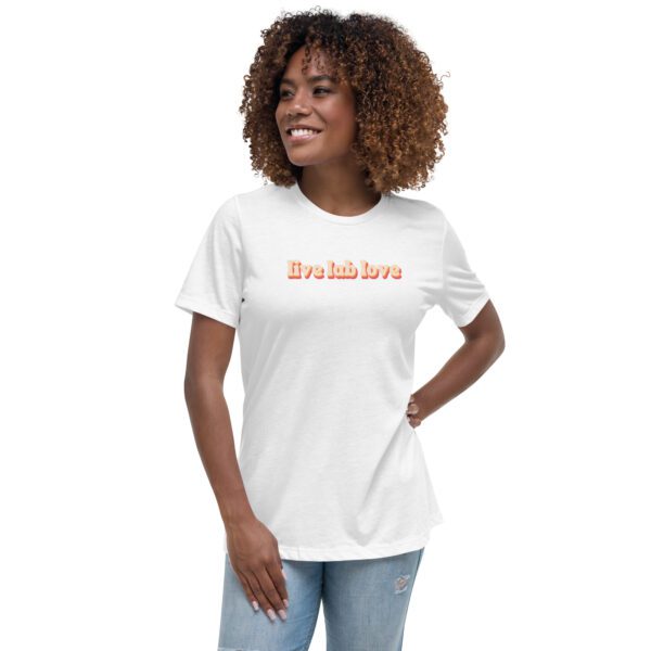 Female model wearing white shirt with "live lab love" in funky retro font/colors